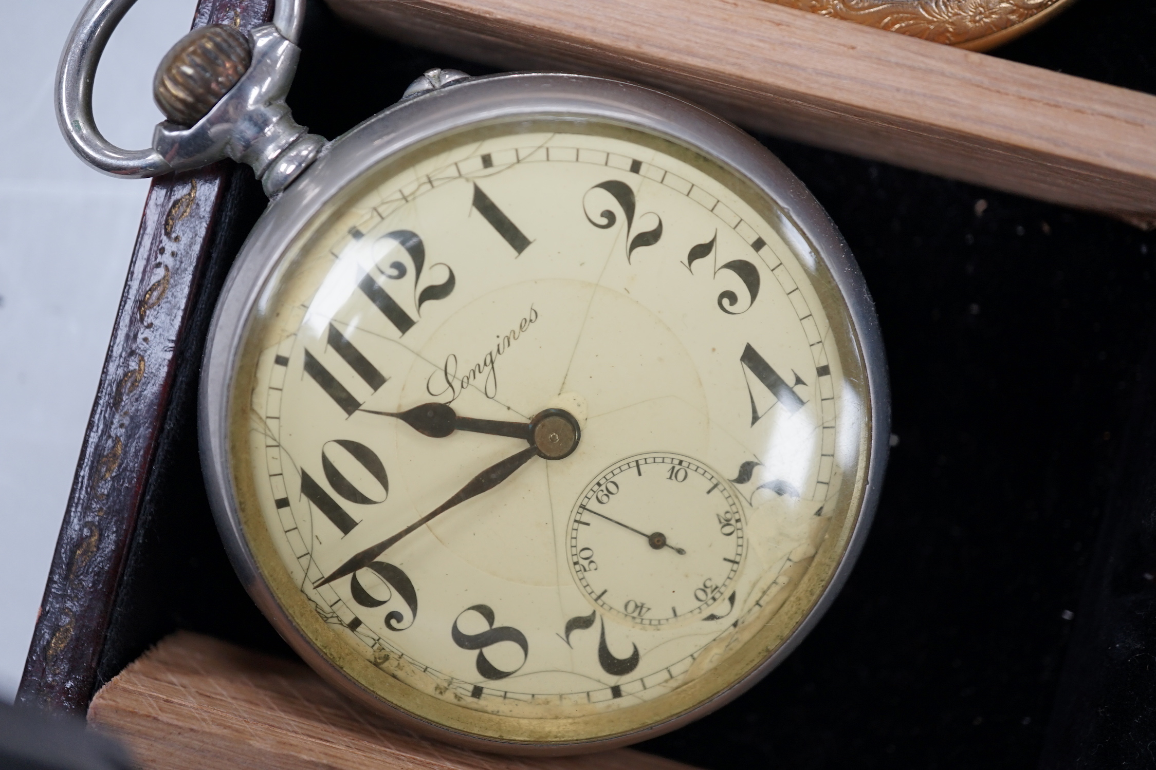 Eight assorted base metal pocket watches including Longines and Acme Lever.